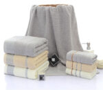 Three sets of Great Wall grid bath towels